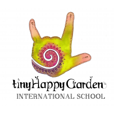 tinyHappy Garden International School logo